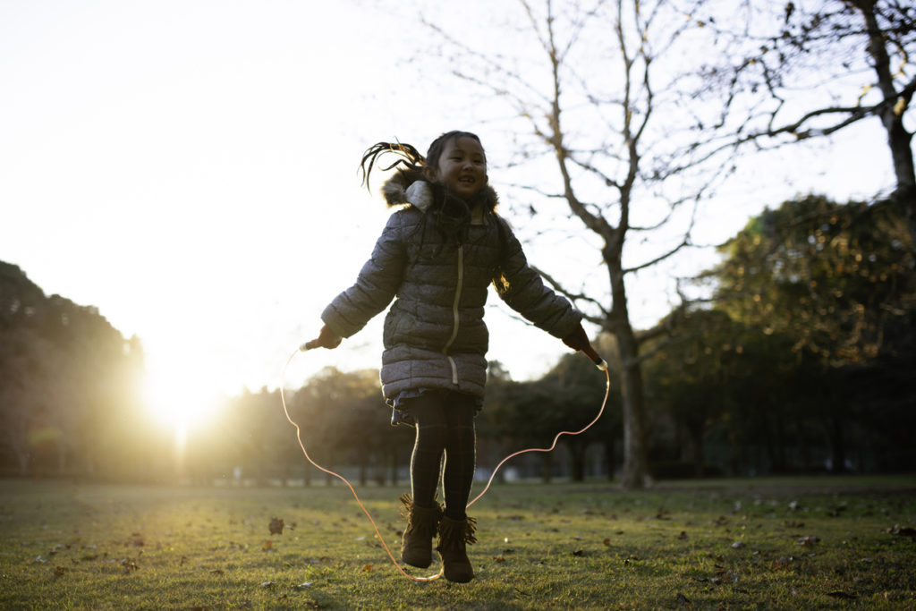 Girl playing with a jump rope