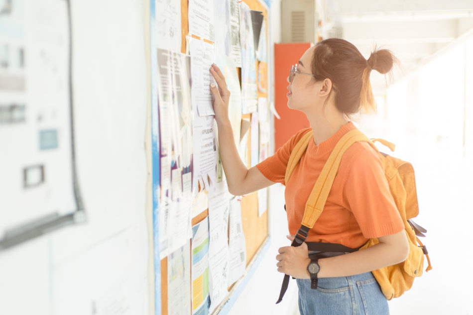 young woman exploring her new school